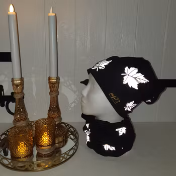 Reflexmössa löv storlek 48-64