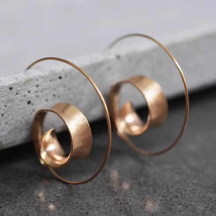 Spiralformade örhängen i roséguldpläterat 925 sterlingsilver