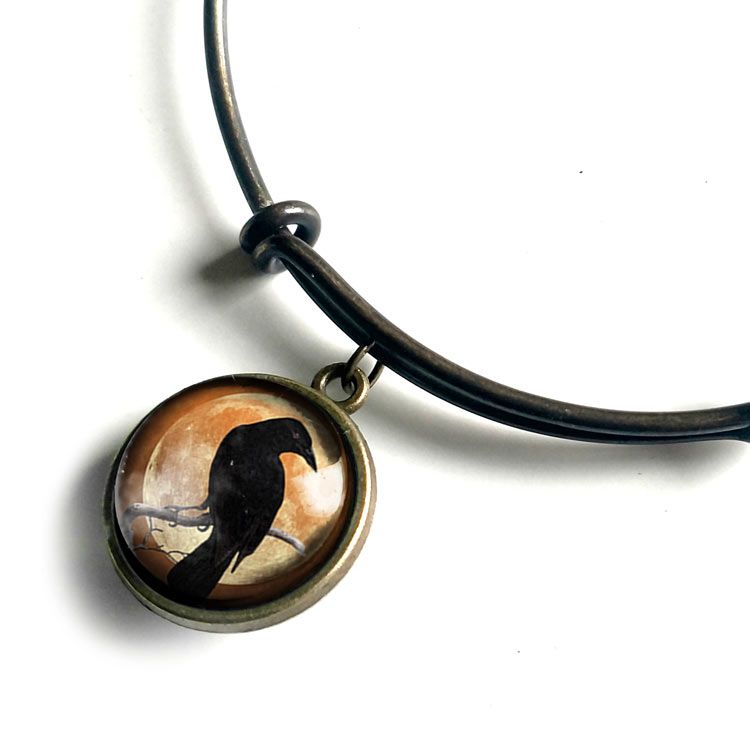 Armband – Kråkfågel, orange måne