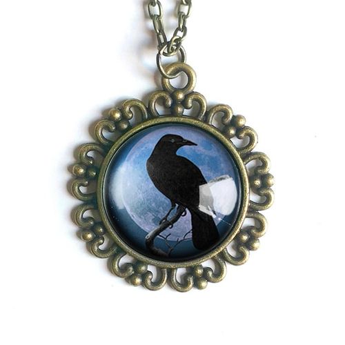 Halsband, ornamenterad berlock – Kråkfågel, blå måne