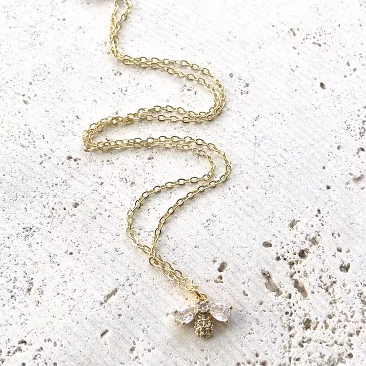 Halsband – Kristallbi, guld
