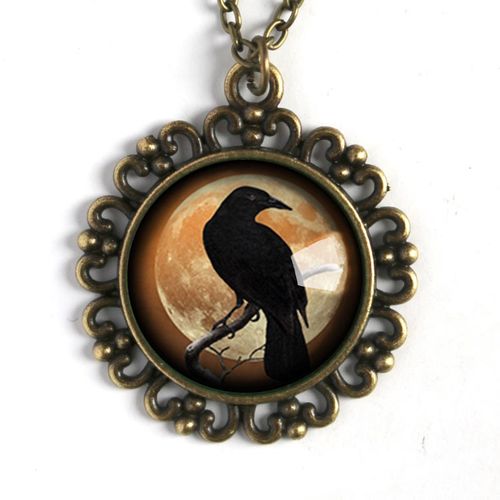 Halsband, ornamenterad berlock – Kråkfågel, orange måne