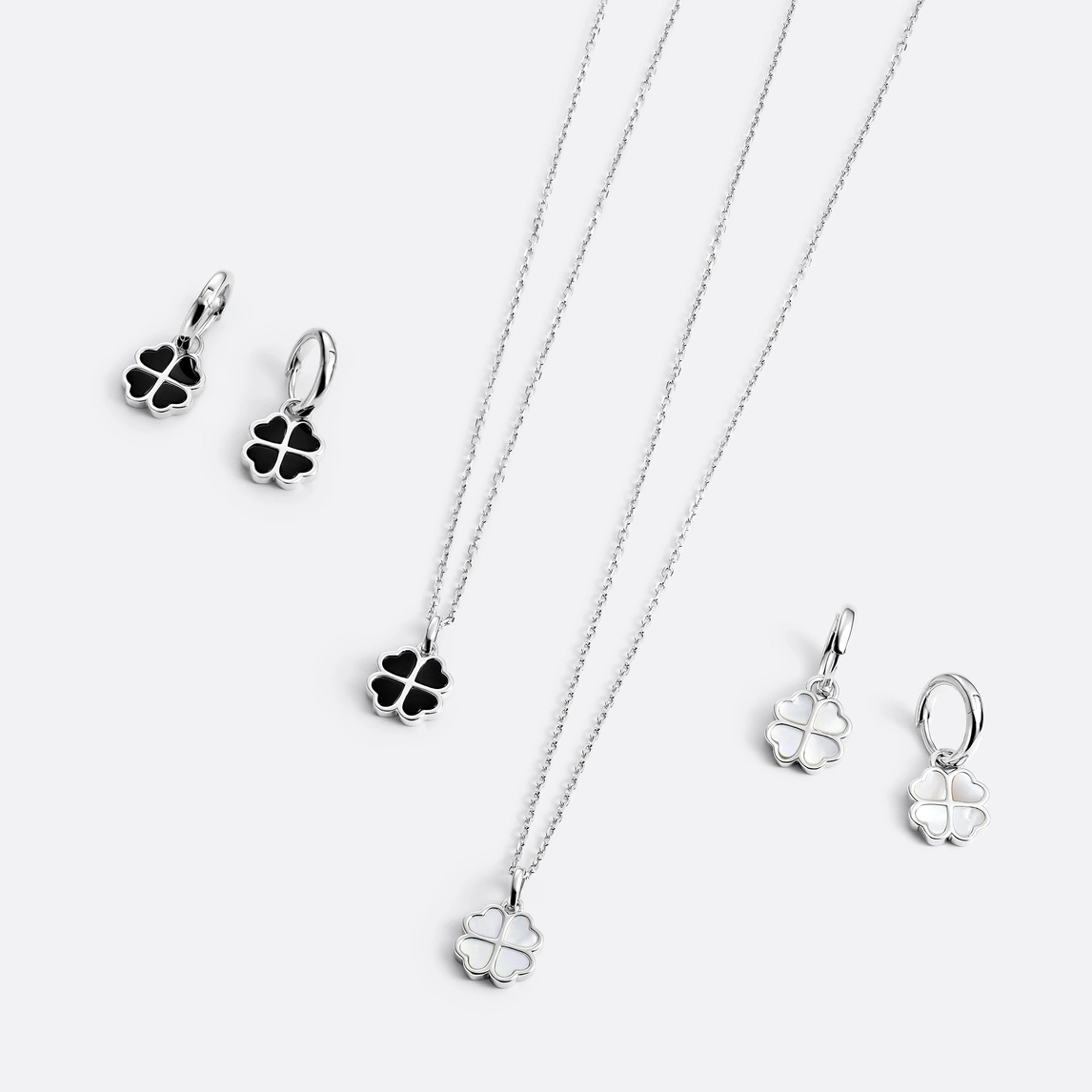 Örhängen – Creoler med fyrklöver i onyx