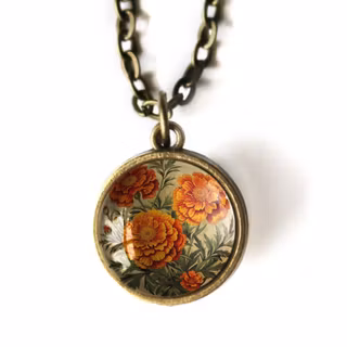 Halsband, dubbelsidig berlock – Tagetes