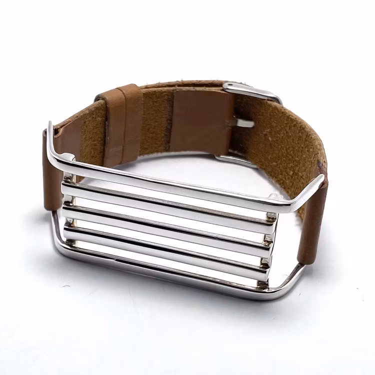 silverarmband med brunt läder. silver bracelet with brown leather