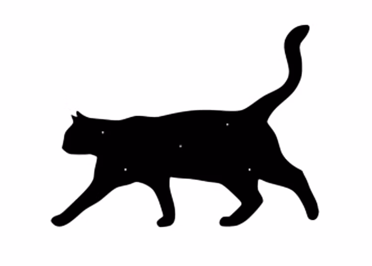 Fasaddekoration i form av siluetten av en stående katt.