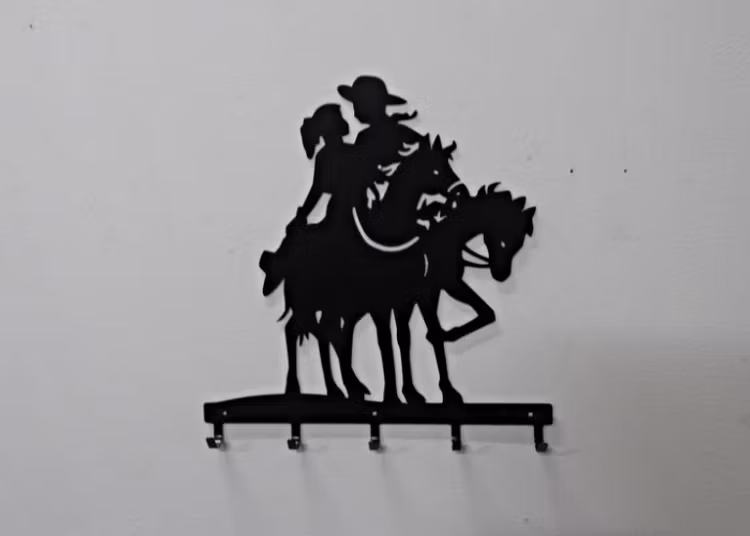 Klädhängare eller handdukshängare med western motiv.