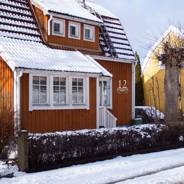 Husnummerskylt med eget namn "Synbarheten"