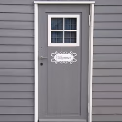 Personlig skylt med utskuren text - "Helheten"