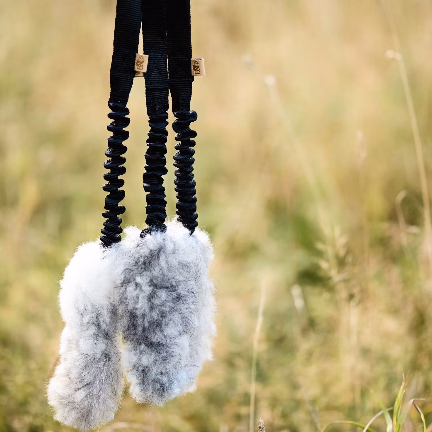 Hundleksak fårskinn med bungee