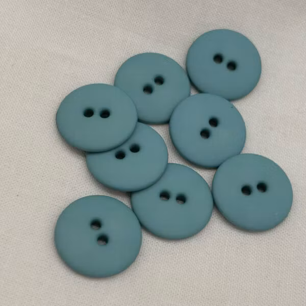 Knapp – Nancy Skyblå – 18 mm ( K190880)