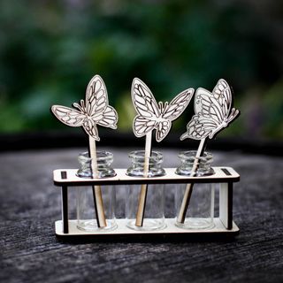 Stickling/eteriska oljor station fjärilar