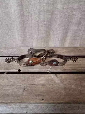 Sporrar med remmar från Weaver stl herr