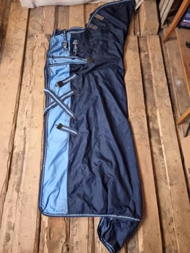 Regntäcke med fast hals 125 cm