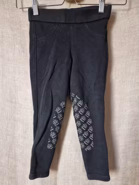Ridtights silikonskodd i collegetyg stl 110 cl i svart