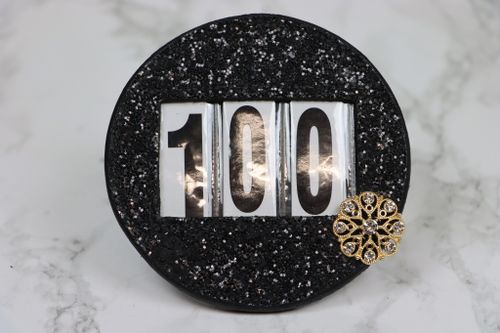 Hulta guld svartglitter