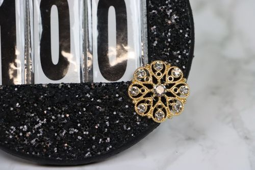 Hulta guld svartglitter