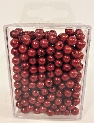 Röda kulor med hål, för dekoration