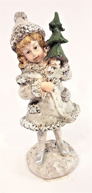 Prydnadsfigur, söt flicka med snöflinga och gran. Detaljfull och dekorativ.