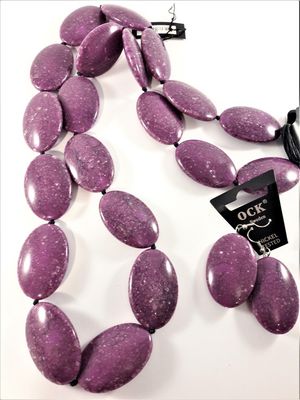 Halsband och matchande örhänge med stora polerade stenar, lila