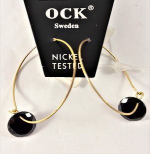 Örhängen med Guldfärgad Ring och Svarta Detaljer