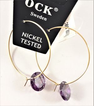 Örhängen med Guldfärgad Ring och Lila Detaljer