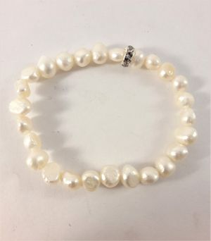 Enkelt Armband med Vita Pärlor och Ring med Strass