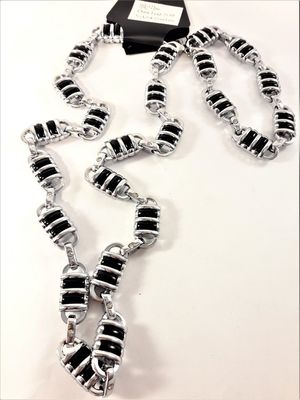 Exklusivt, tungt, silverfärgat halsband med ovala, randiga länkar och matchande armband