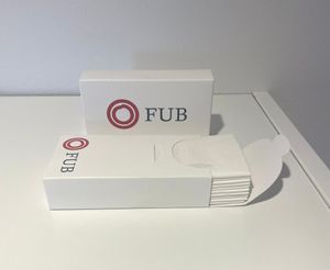 Näsdukar i pappersbox med FUB:s logga