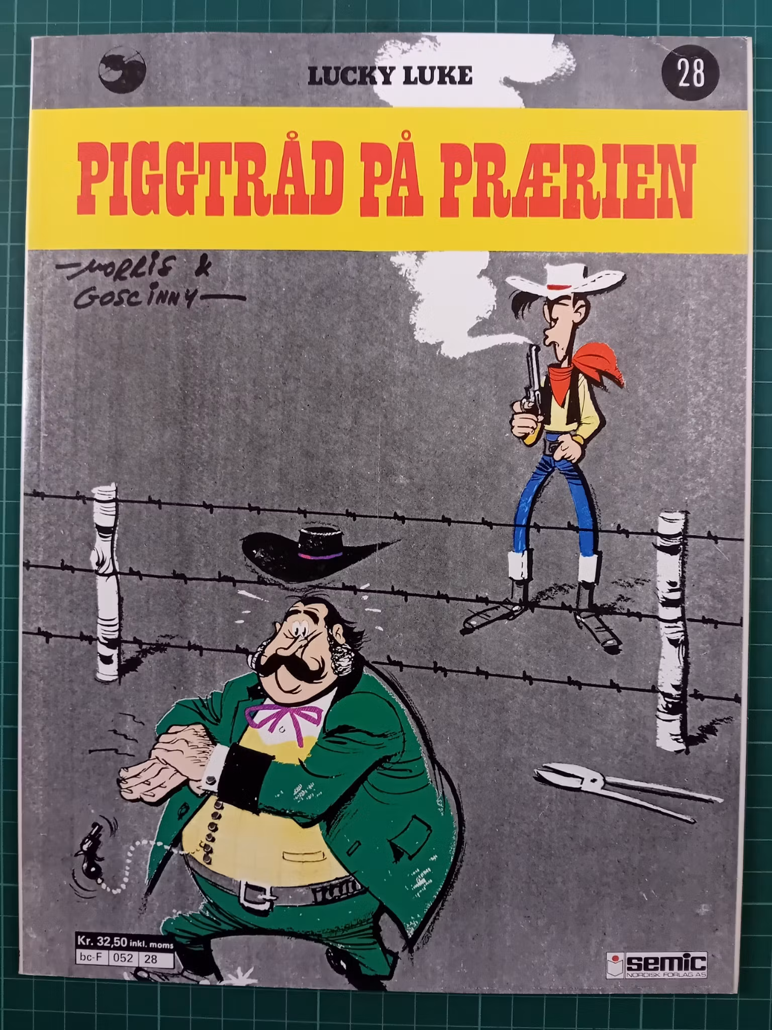 Lucky Luke 28 Piggtråd på prærien