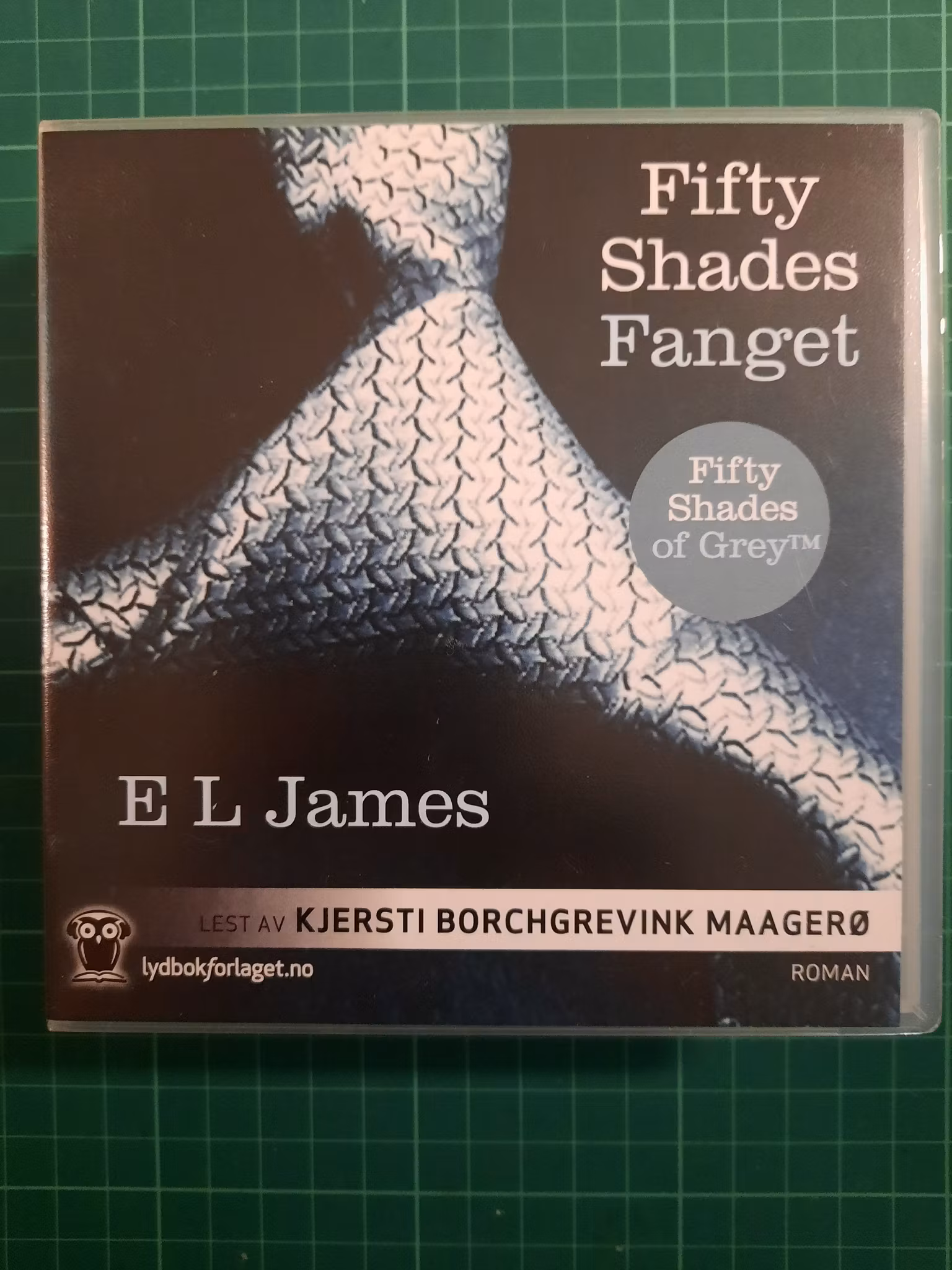Lydbok : Fifty shades fanget