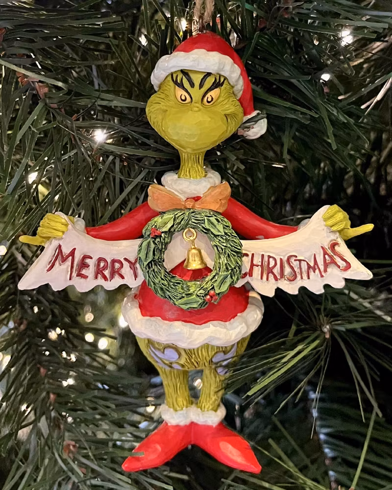 Grinch Holding Merry Christmas Banner (Hanging Ornament)
