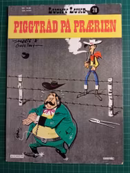 Lucky Luke 28 Piggtråd på prærien
