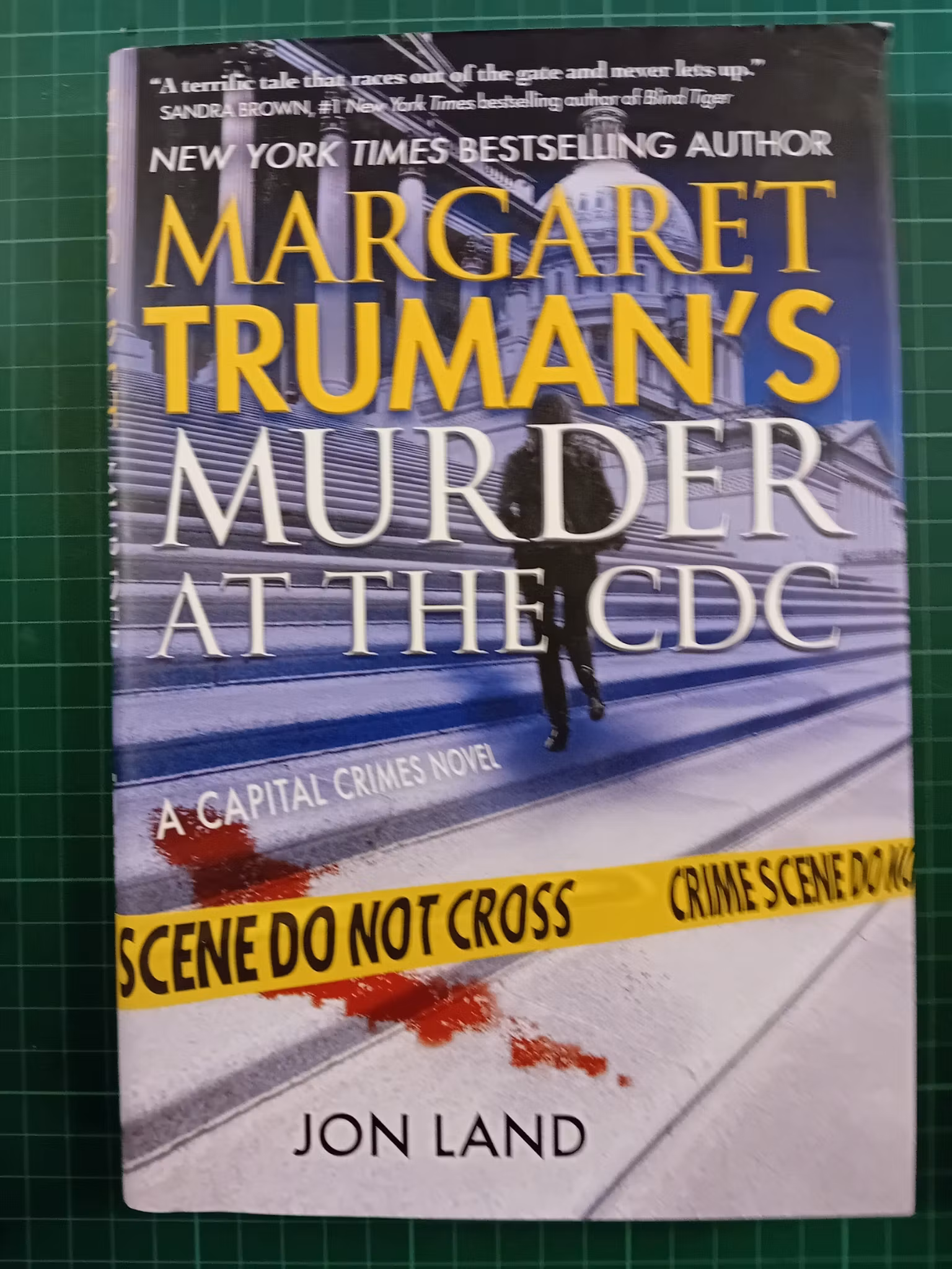 Jon Land : Margaret Truman's Murder at the CDC: A Capital Crimes Novel
