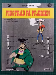 Lucky Luke 28 Piggtråd på prærien