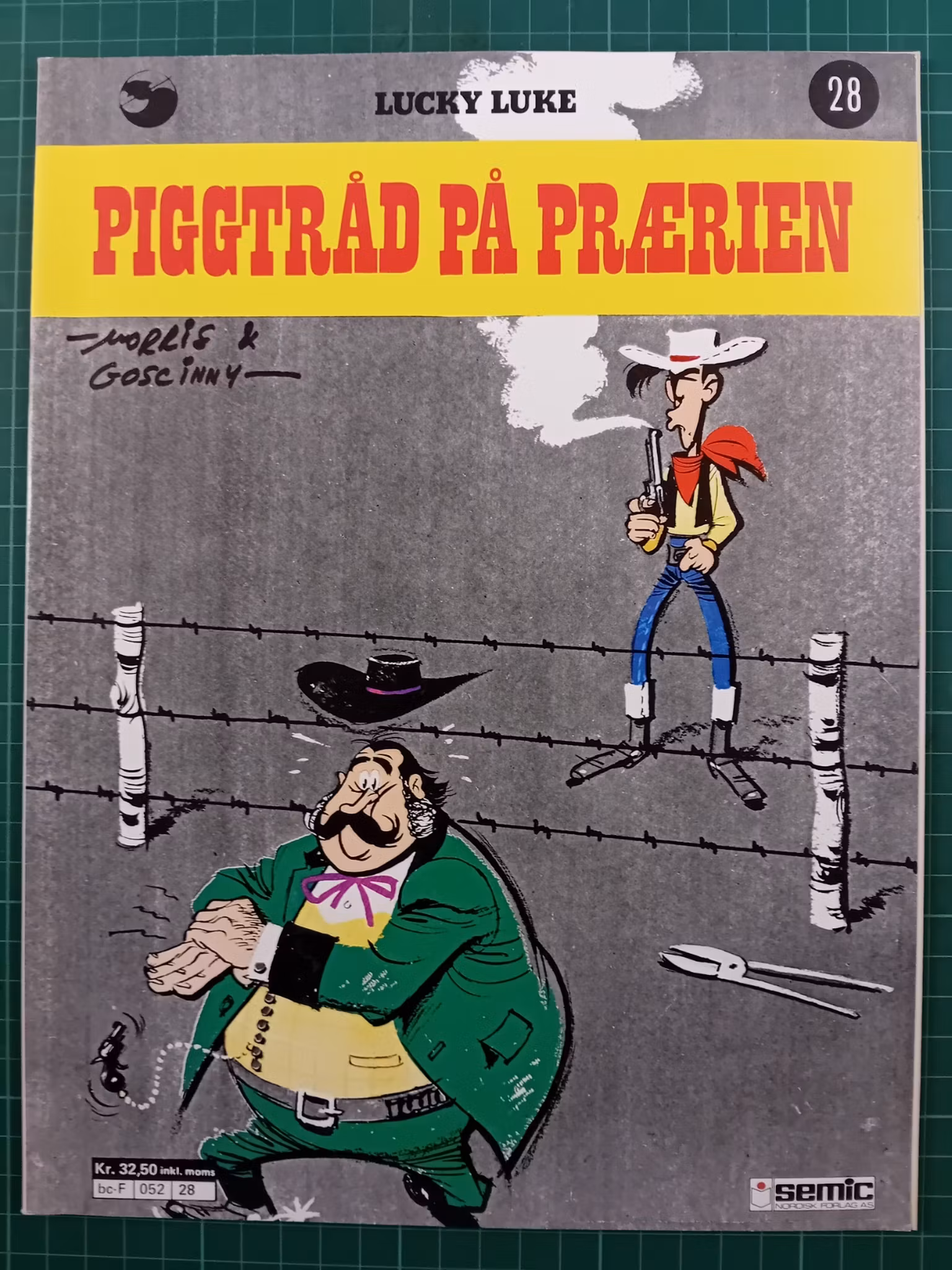 Lucky Luke 28 Piggtråd på prærien