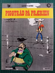 Lucky Luke 28 Piggtråd på prærien