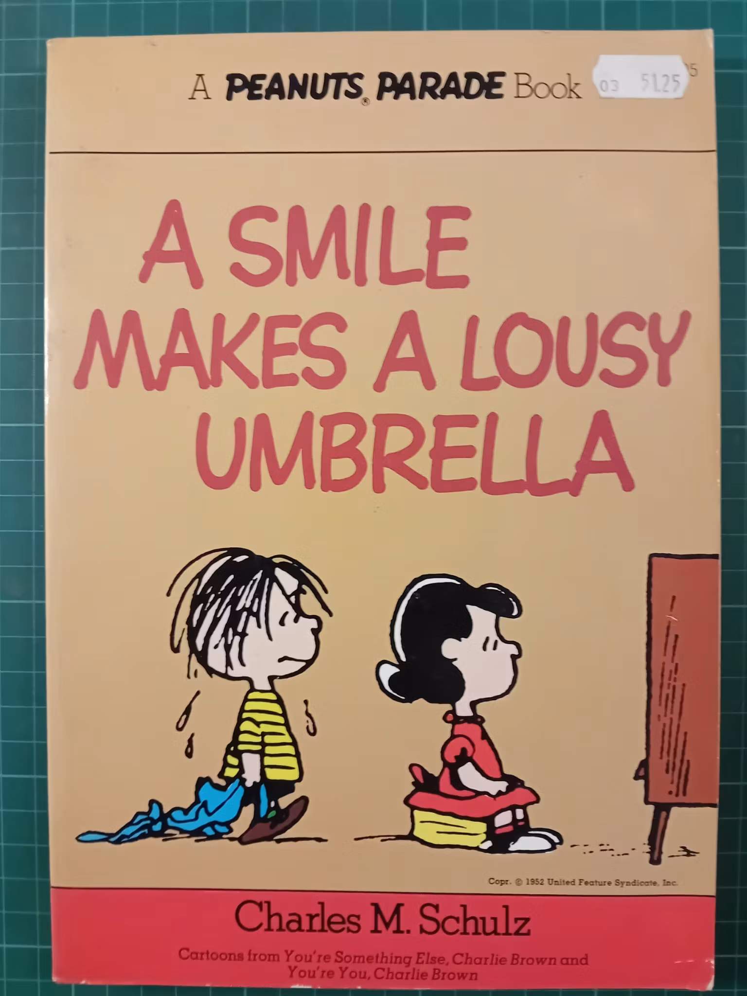 Peanuts : A smile makes a lousy umbrella