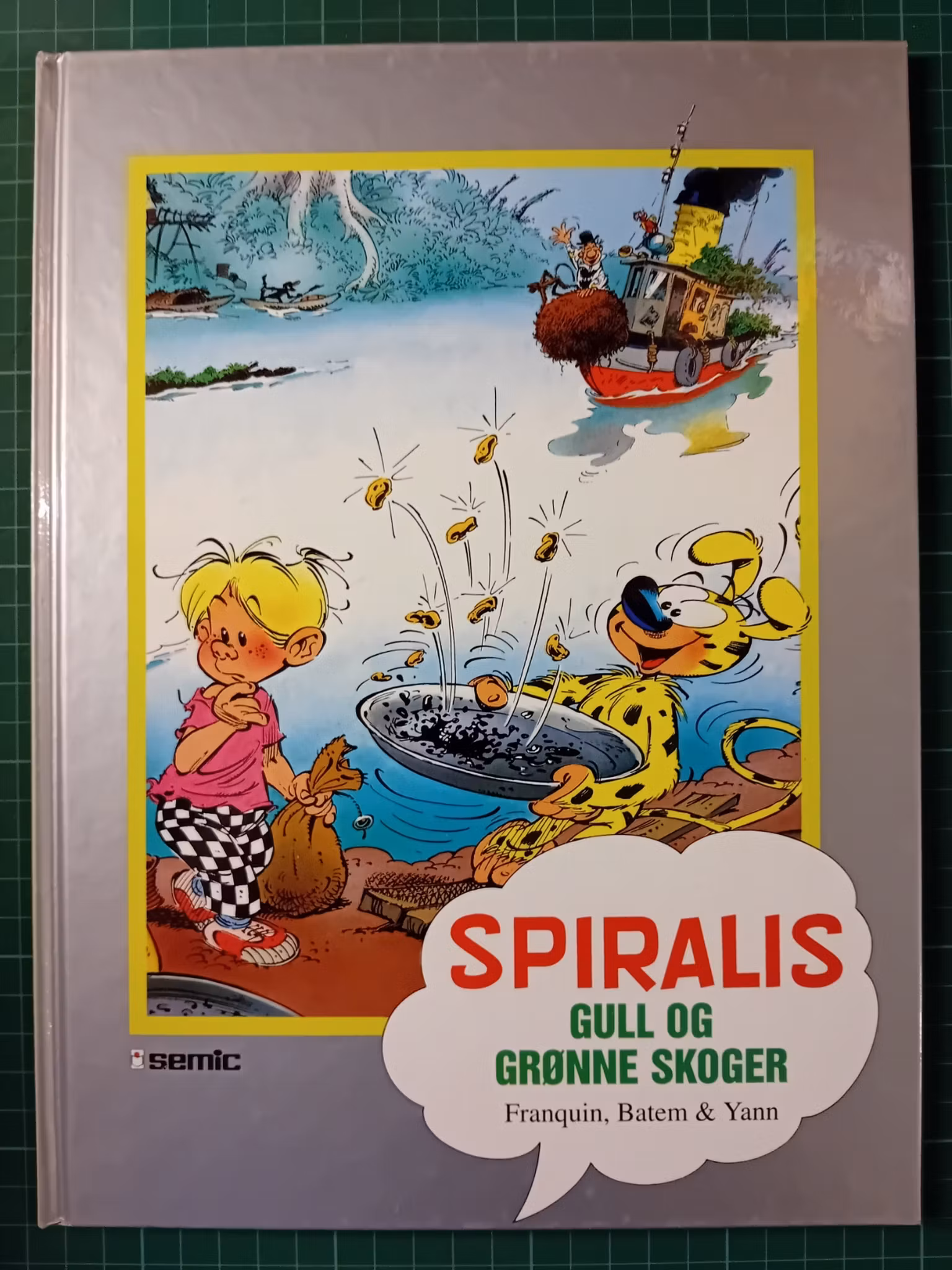 Spiralis gull og grønne skoger