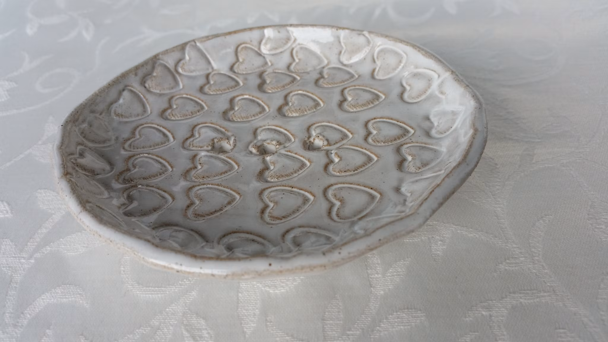 Ovalt tvålfat med mönster och fötter