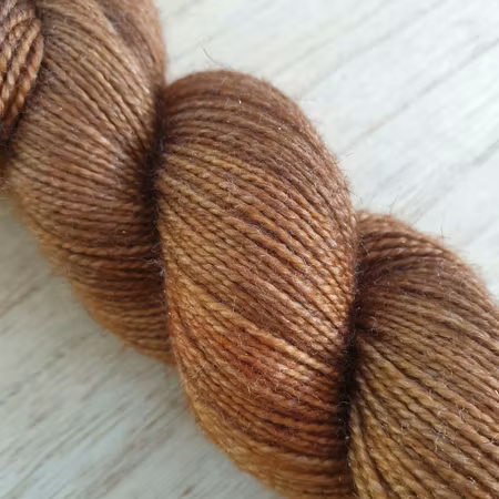 Bronsestatue -glittersokk