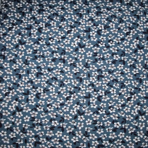 Trikåtyg Blågrå med små blommor