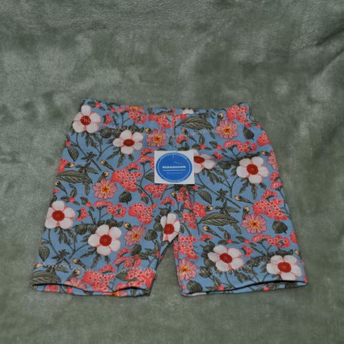 Dock - Shorts blåa med blommor stl 37 cm