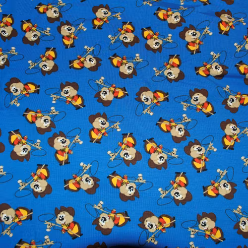 Trikåtyg Kornblå botten med cowboy