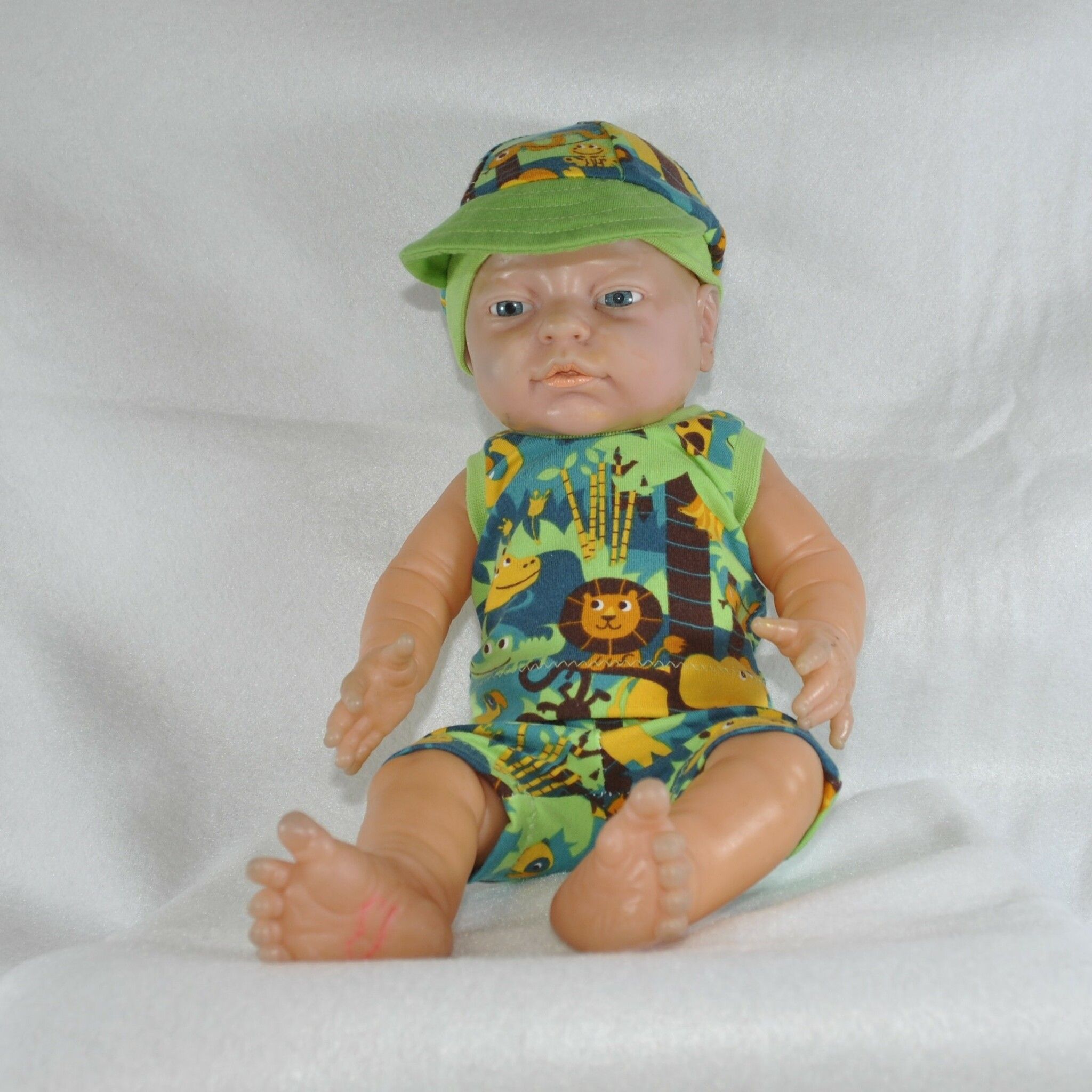 Dock - Dress grön med djungeldjur stl 37 cm