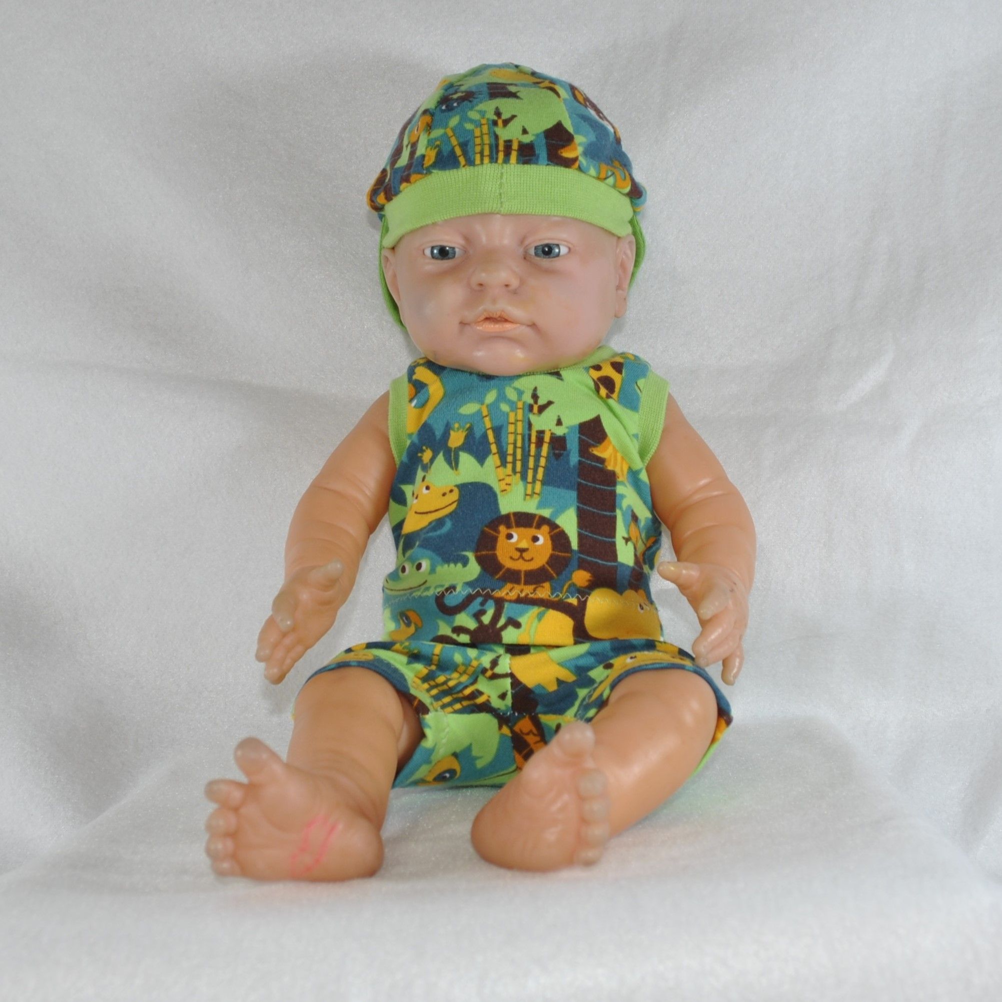 Dock - Dress grön med djungeldjur stl 37 cm