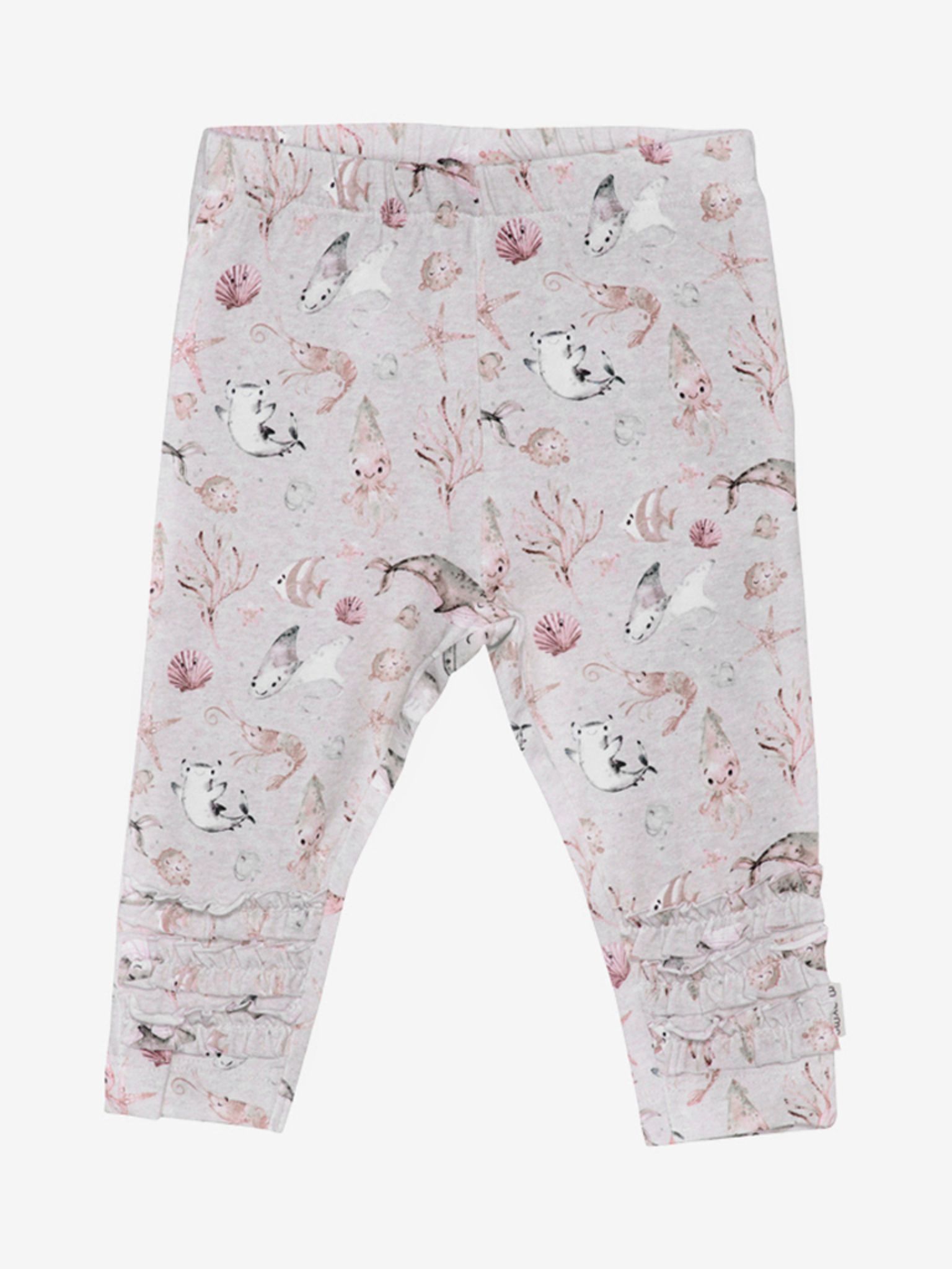 Söta leggings med volangdetalj i benslut. Beige botten, motiv tema havsdjur.