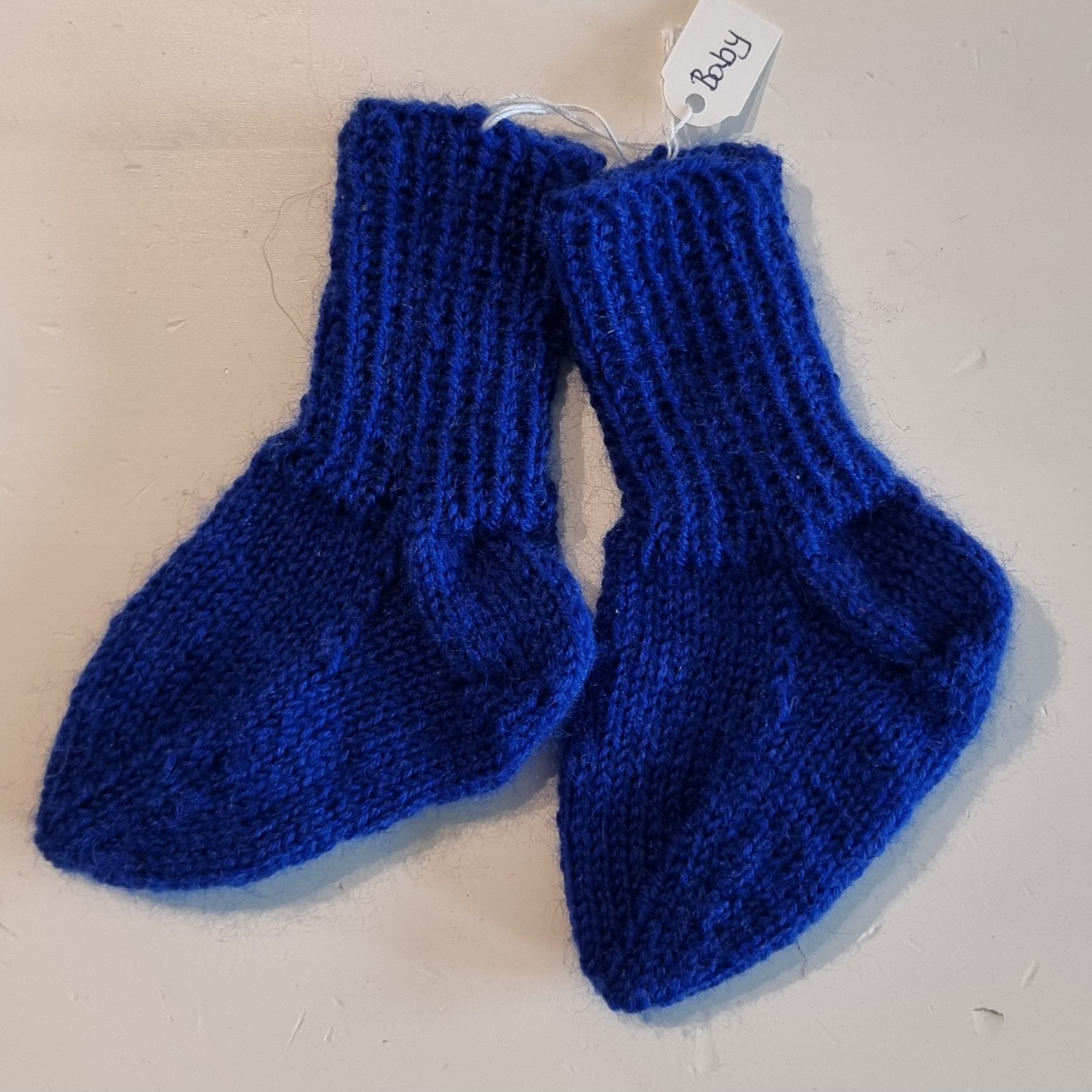 Hemstickade sockor barn