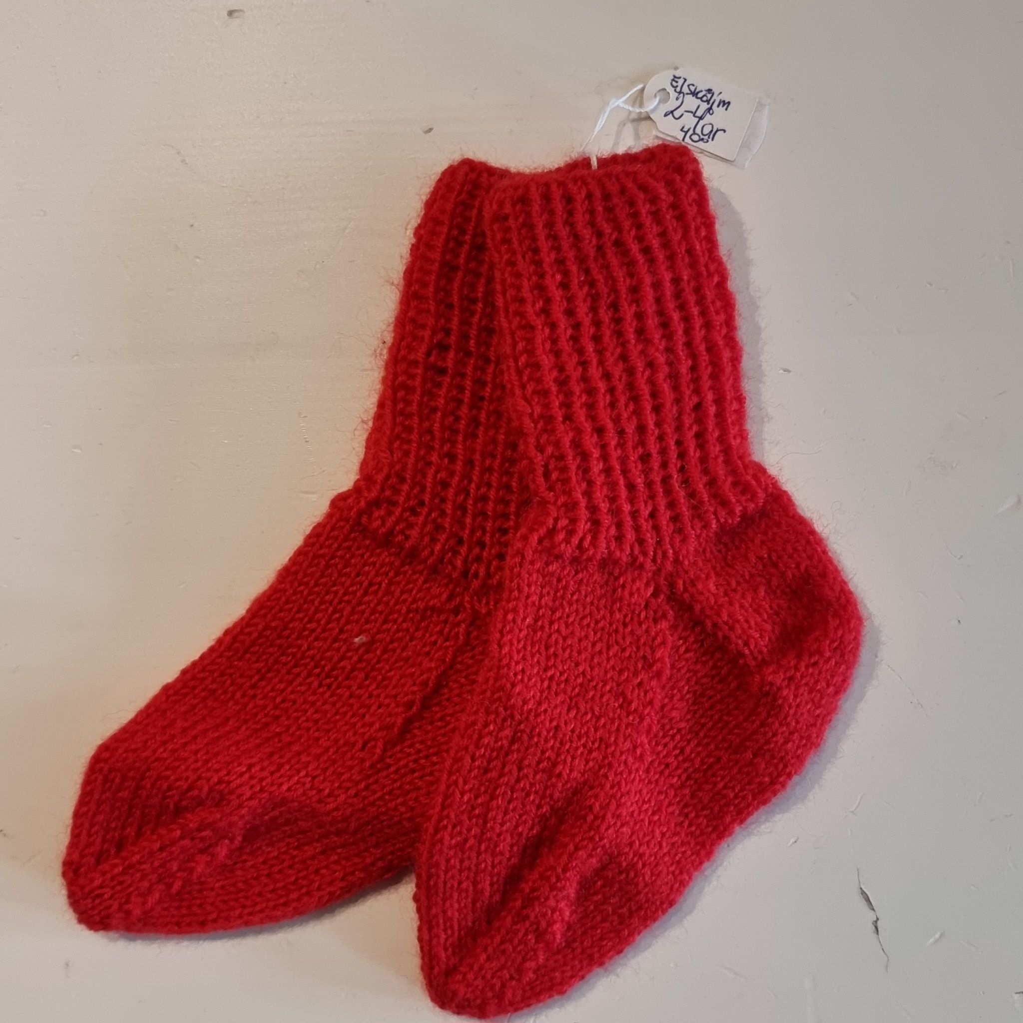 Hemstickade sockor baby