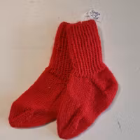 Hemstickade sockor baby